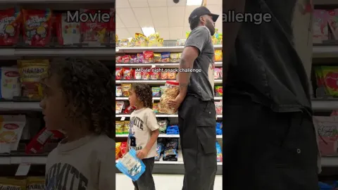 Father and Son Battle Over Best Movie Night Snacks