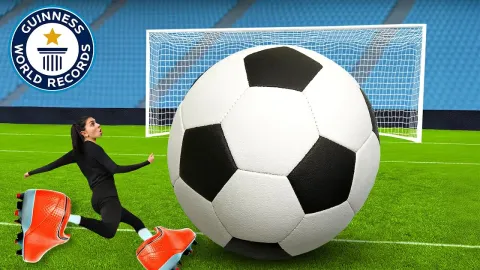 Giant Football Gear Challenge with the Tallest Referee