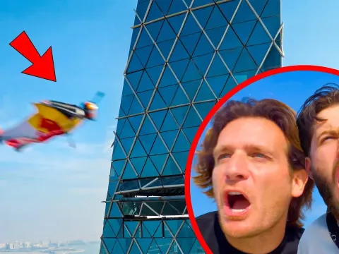 Extreme Athletes Fly Through Skyscraper in Wing Suit Stunt