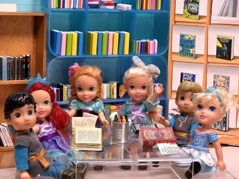 Elsa and Anna Teach Library Etiquette with Barbie Dolls