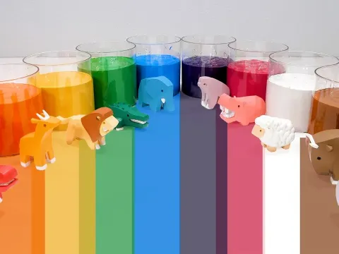 Learning English and Spanish Animal and Color Names with Toys