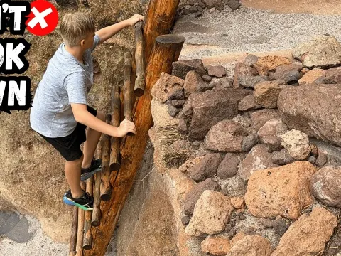 Daredevil Scales a 14-Story Ladder on a Steep Cliff