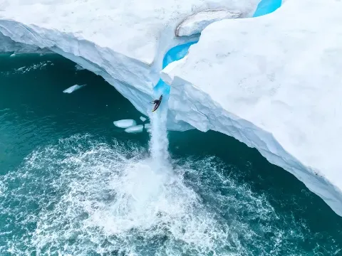 Kayaking Off an Arctic Ice Wall Waterfall in Svalbard