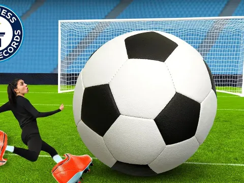 Giant Football Gear Challenge with the Tallest Referee