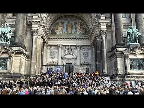 Greek and German Choirs Unite for Emotional Unity Day Performance at Berlin Cathedral